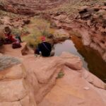 Resting near a spring pool on the hike out.